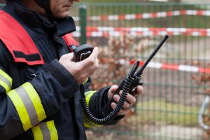Fireman holding a walkie-talkie