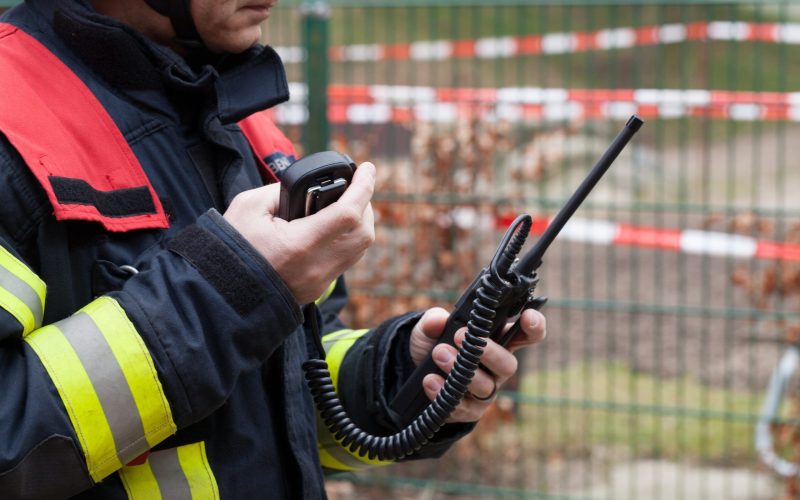 Fireman holding a walkie-talkie