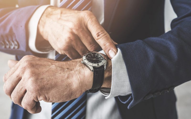 Man checking time his watch
