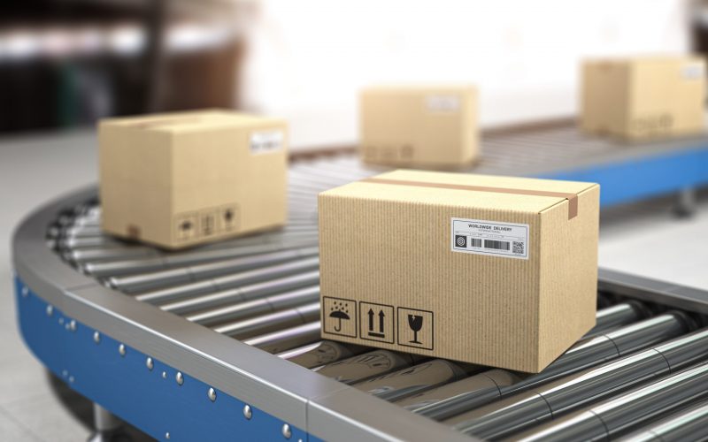 Сardboard boxes on conveyor in warehouse. Delivery, storage and distribution service concept. 3d illustration