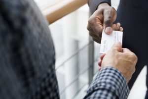 handing out business card