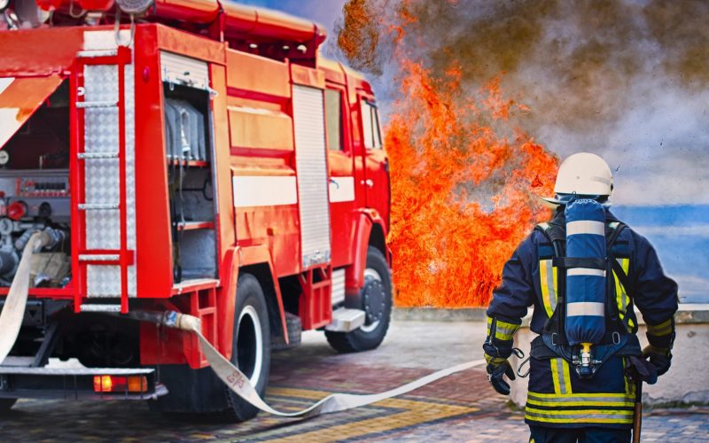 fireman wearing fire fighter suit for safety under danger situation to fighting with flame in an emergency situation, firefighter training